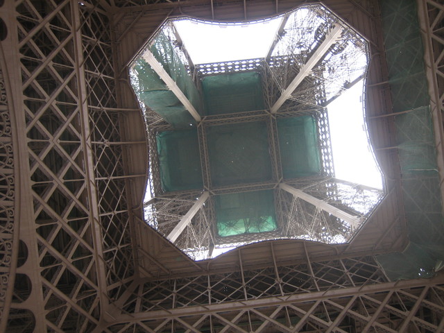 Looking straight up through the Eiffel Tower