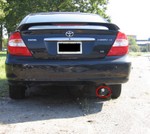 My car. Doesn't look too bad, does it? But what's that in the tailpipe? Note the piece circled in red.